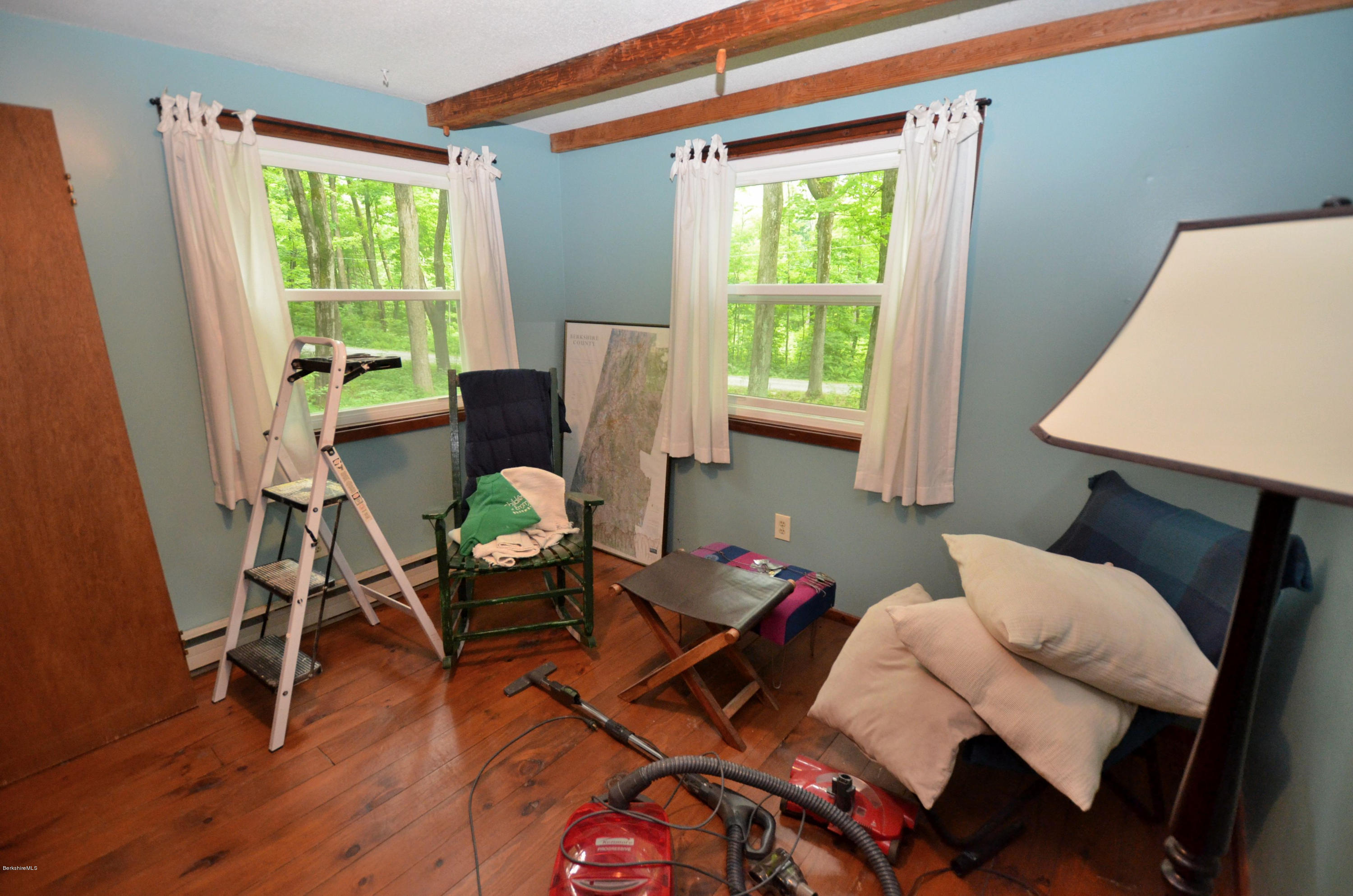 204 Stebbins Road Otis, MA 01253 - Photo 5 of 9 a living room with furniture and a window