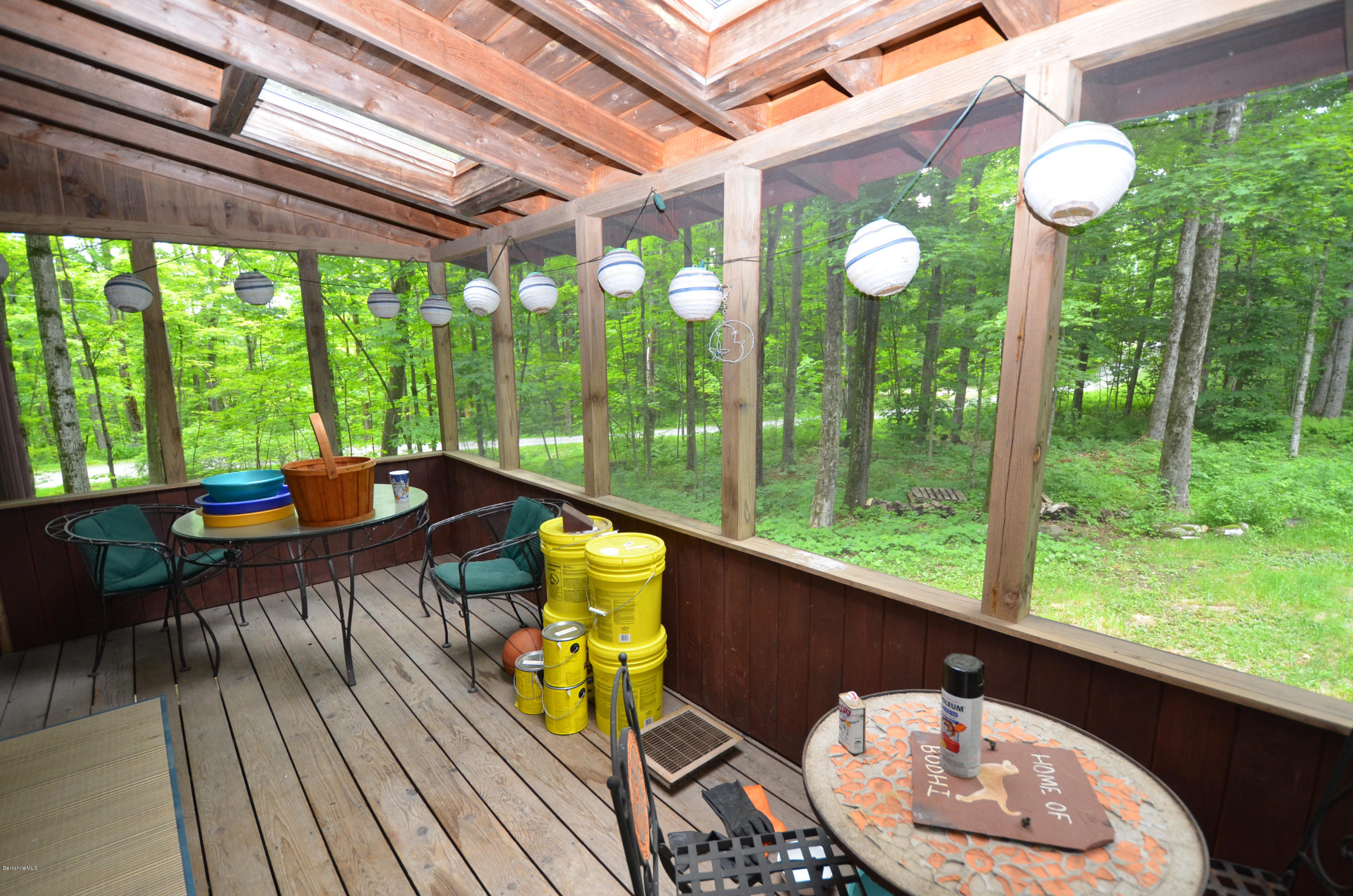 204 Stebbins Road Otis, MA 01253 - Photo 6 of 9 a view of a chairs and table in patio with wooden fence