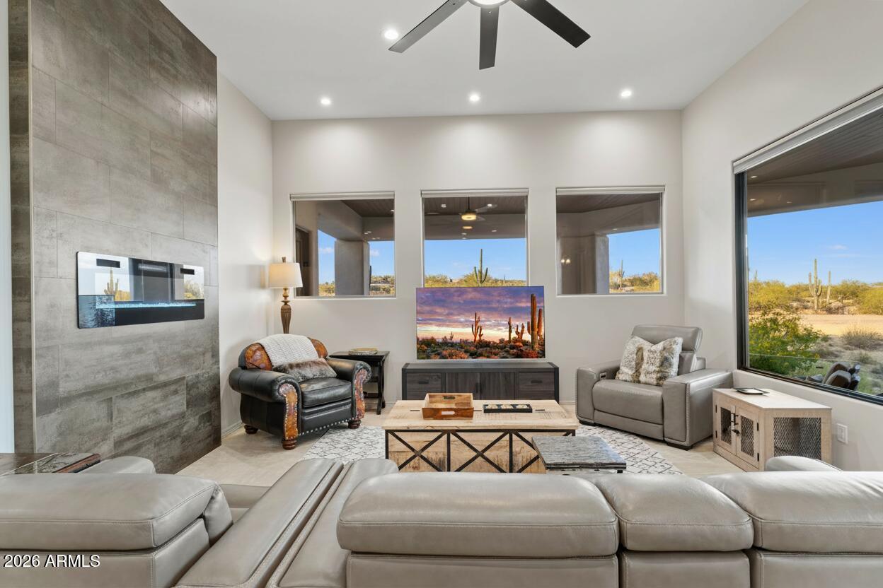15730 East Eagle Crest Road Fountain Hills, AZ 85268 - Photo 25 of 77 a living room with furniture and a flat screen tv