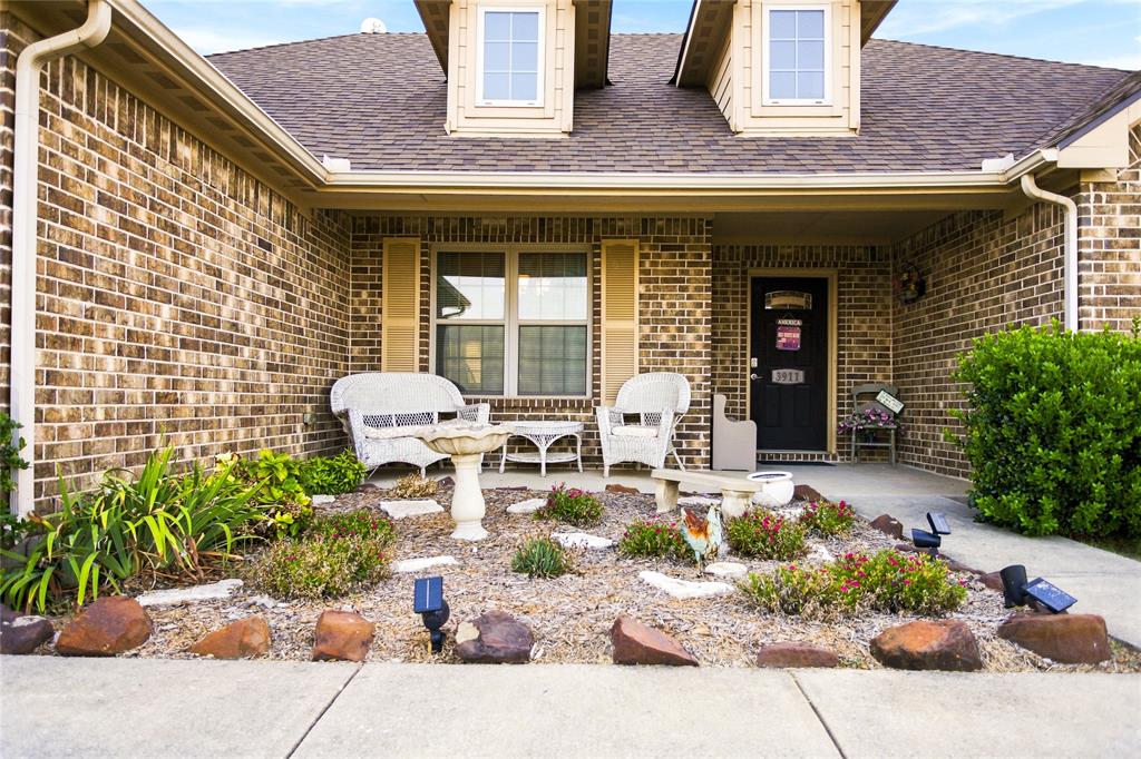 3911 Bennett Road Howe, TX 75459 - Photo 4 of 34 The front entry is a whimsical porch where you can enjoy the view of an open field... birds singing and open space!