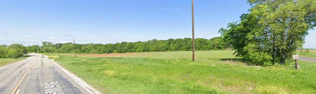 8024 County Road 204 Grandview, TX 76050 - Photo 1 of 2 a view of a garden with a lake