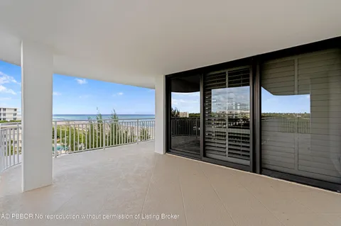 a view of a porch with wooden floor
