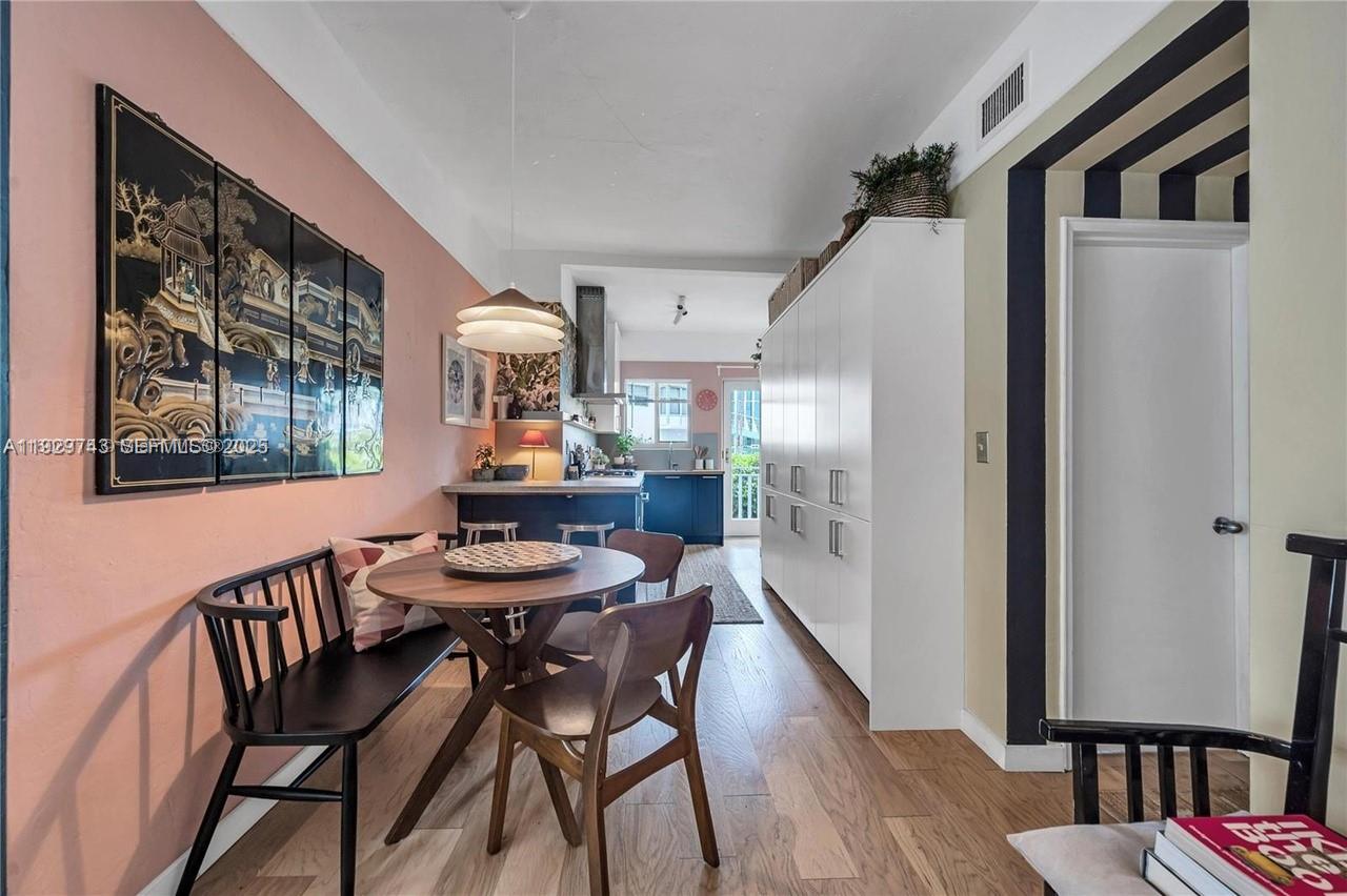 1840 James Avenue, Unit 23 Miami Beach, FL 33139 - Photo 5 of 10 a dining room with furniture and window