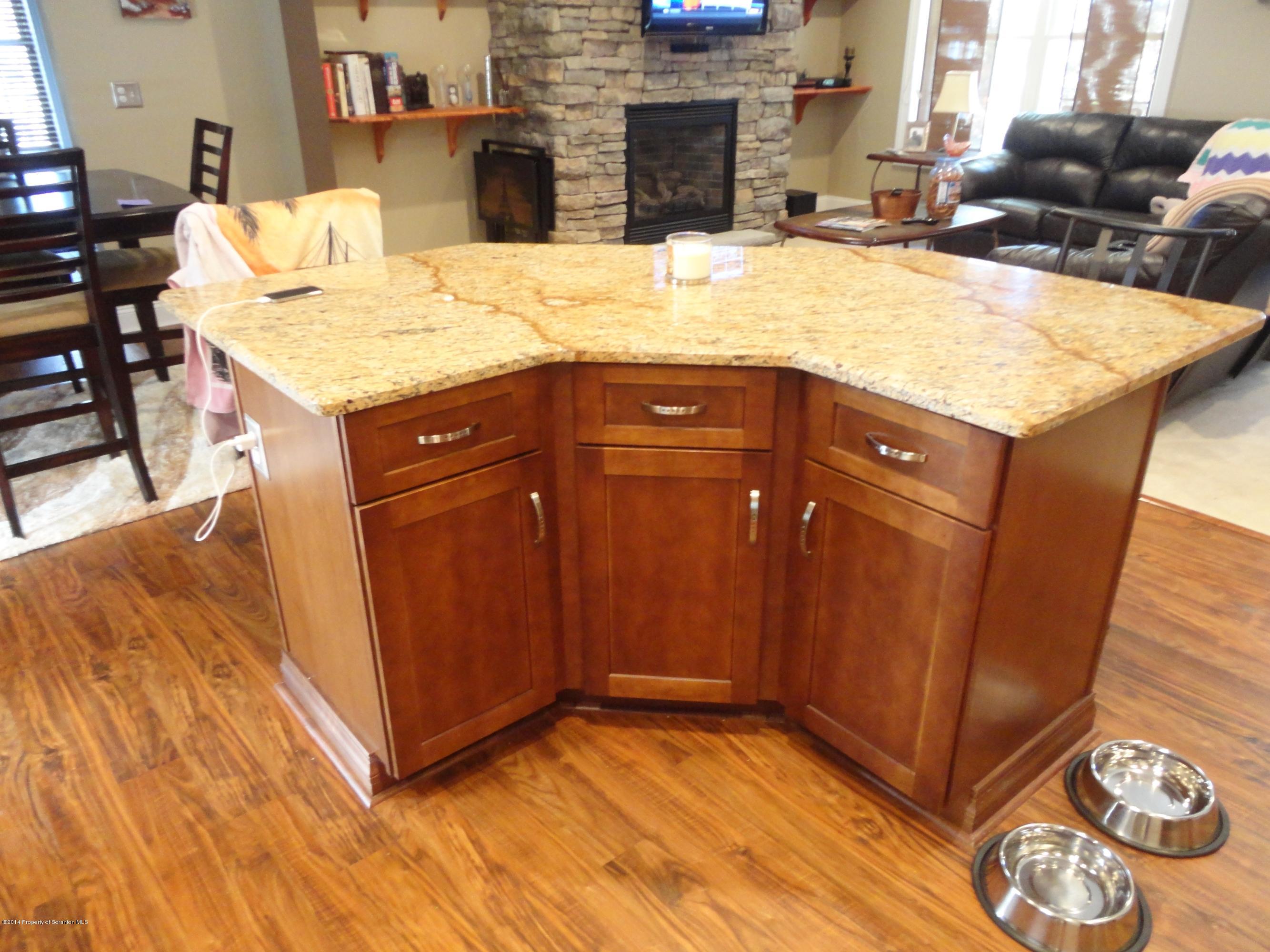 910 Line Road Lake Ariel, PA 18436 - Photo 21 of 48 a kitchen with a sink and a refrigerator