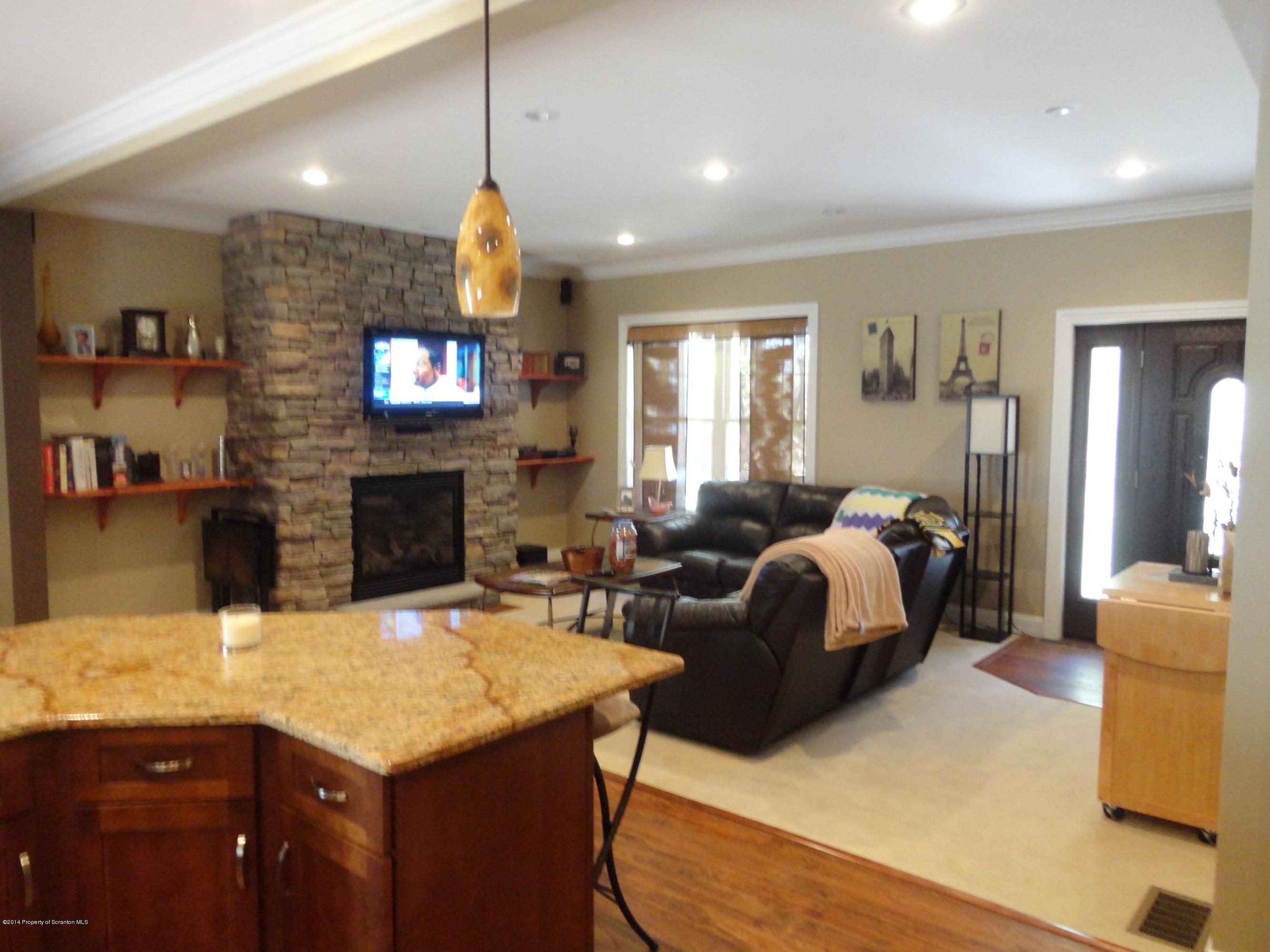 910 Line Road Lake Ariel, PA 18436 - Photo 22 of 48 a living room with fireplace furniture and a flat screen tv