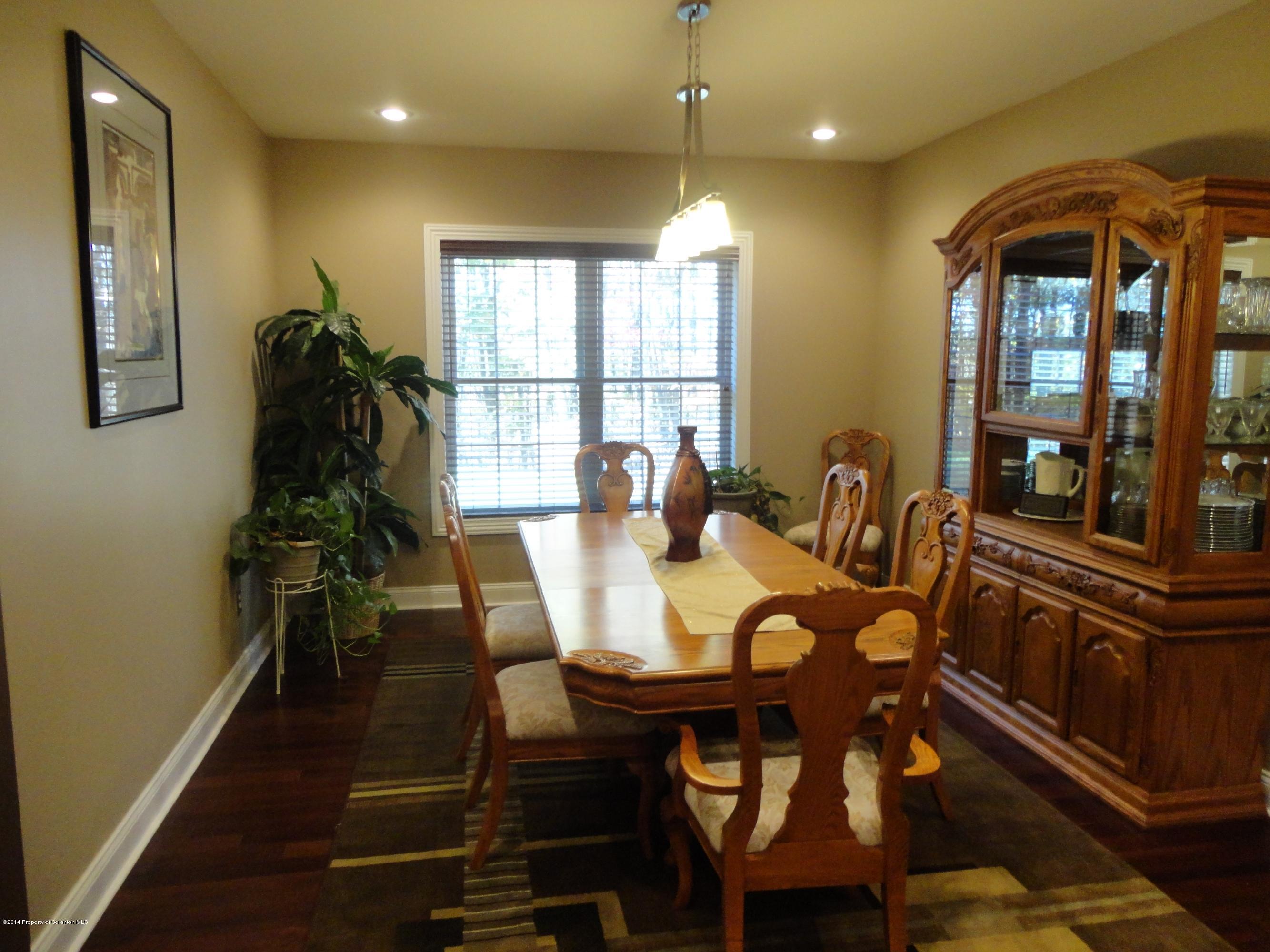 910 Line Road Lake Ariel, PA 18436 - Photo 25 of 48 a view of a dining room with furniture window and wooden floor