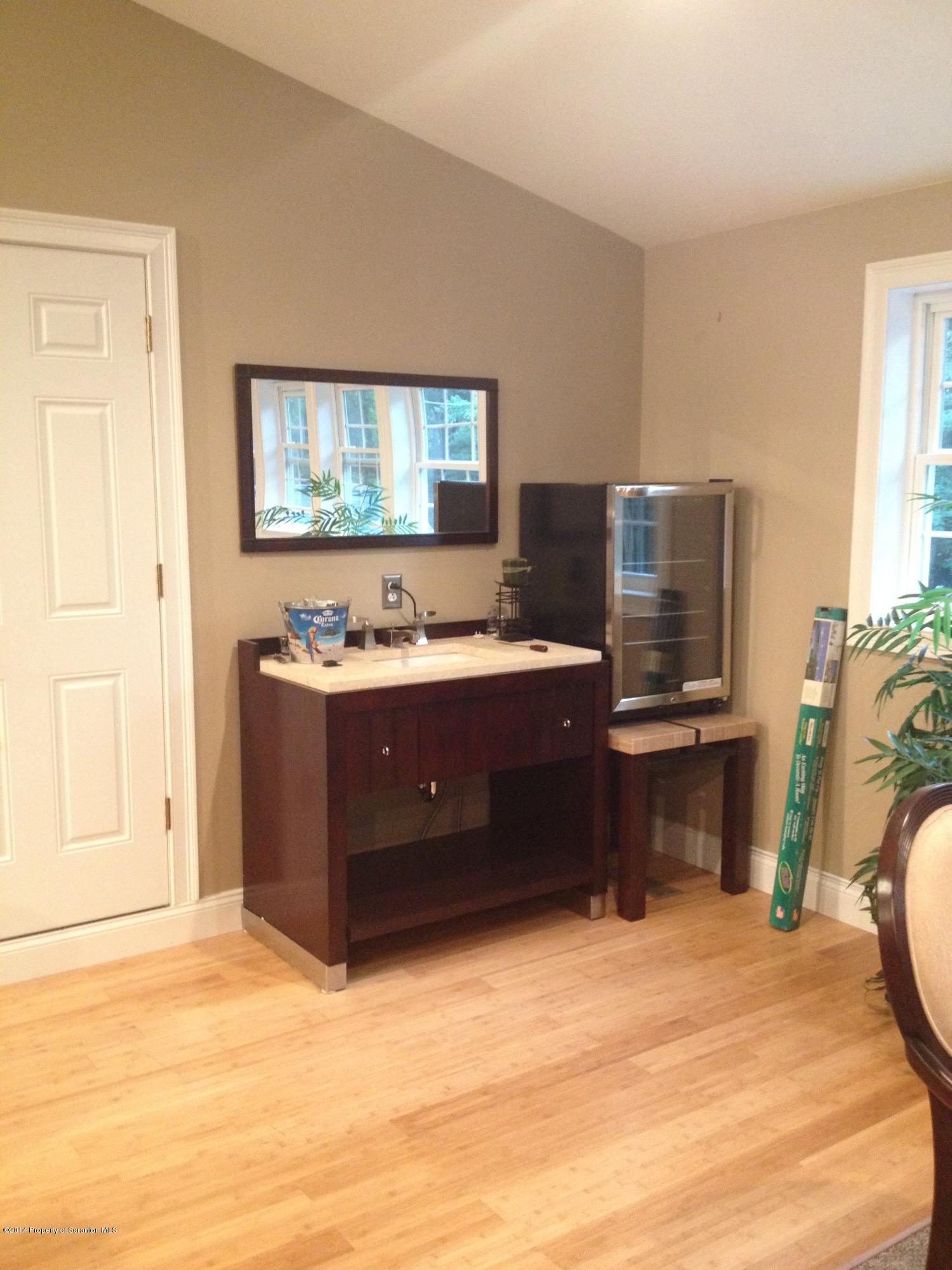 910 Line Road Lake Ariel, PA 18436 - Photo 41 of 48 a room with a bed and a cabinets