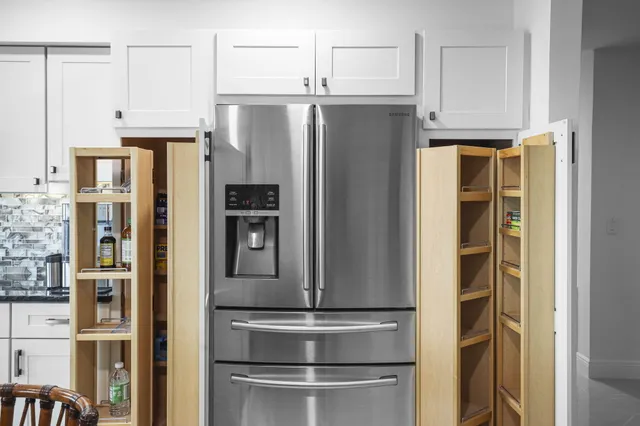 a bathroom with a toilet and a shower curtain