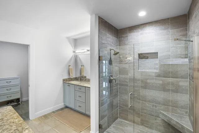 a view of a swimming pool with a porch