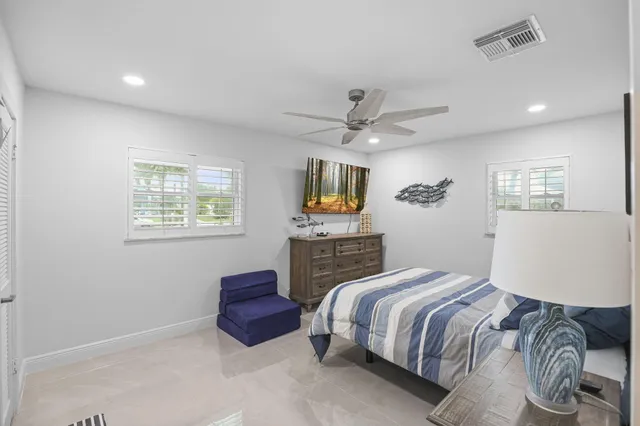 a patio with a yard table and chairs