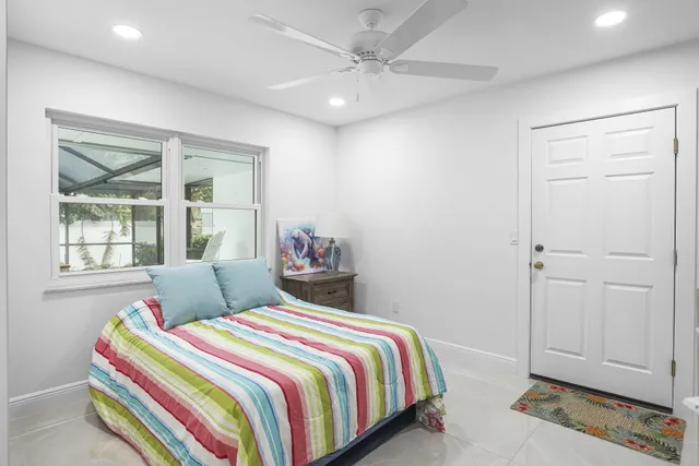 a view of a lake with houses in the background