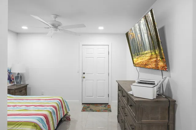 a backyard of a house with outdoor seating