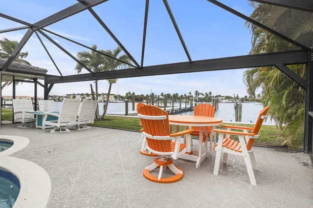 an aerial view of a house with outdoor space