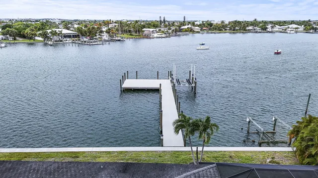 an aerial view of a house with a mountain view