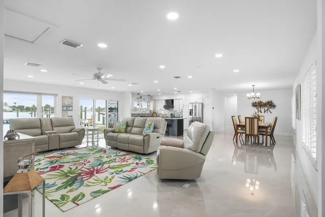 a kitchen with stainless steel appliances and refrigerator