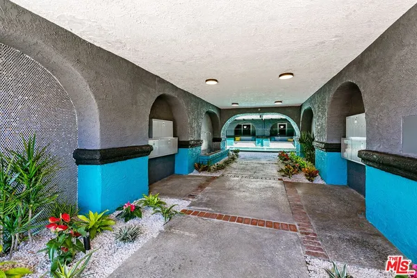 a view of a living room and a garage