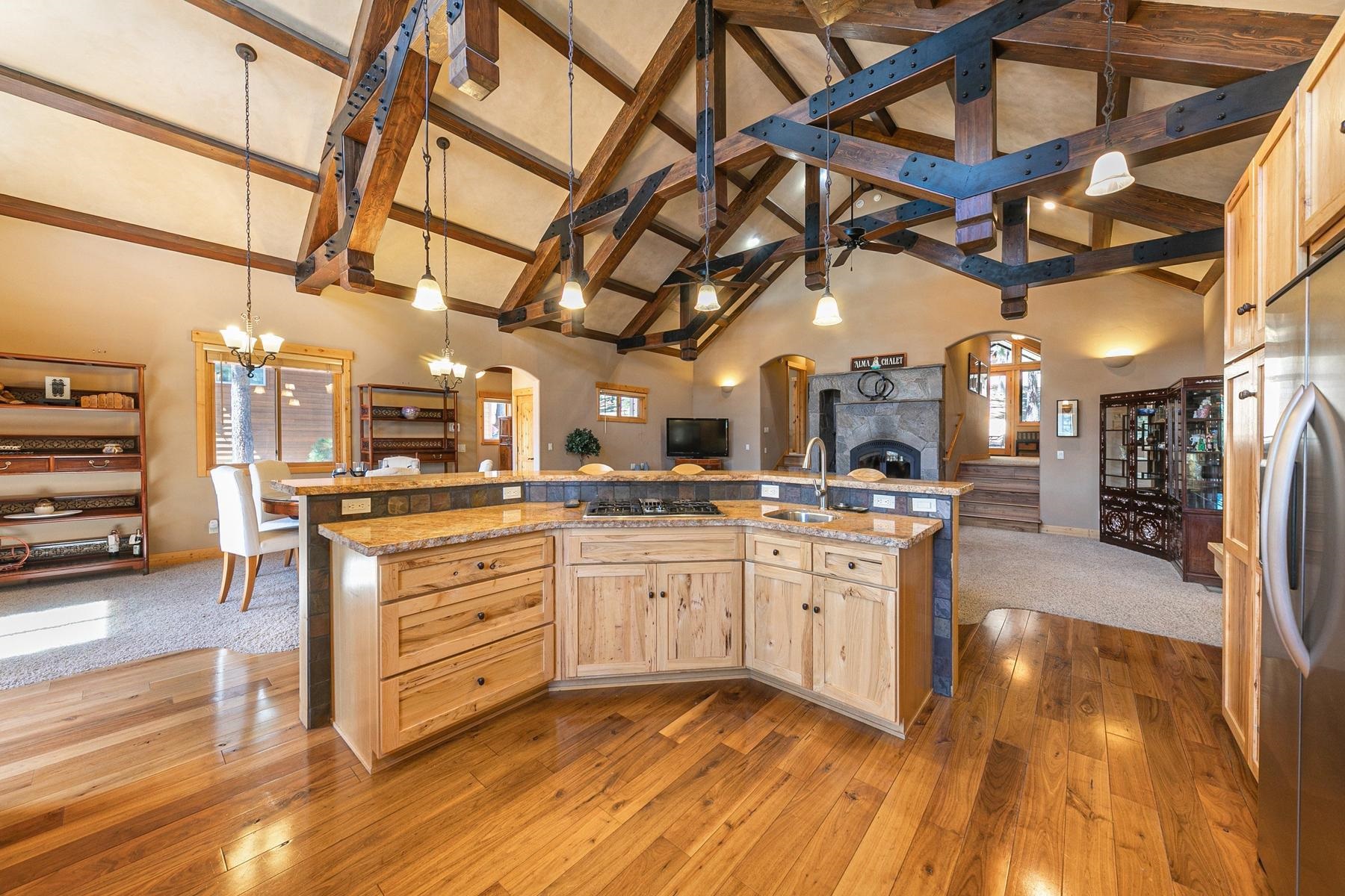 14070 Alder Creek Road Truckee, CA 96161 - Photo 5 of 28 a large kitchen with stainless steel appliances granite countertop a stove and cabinets