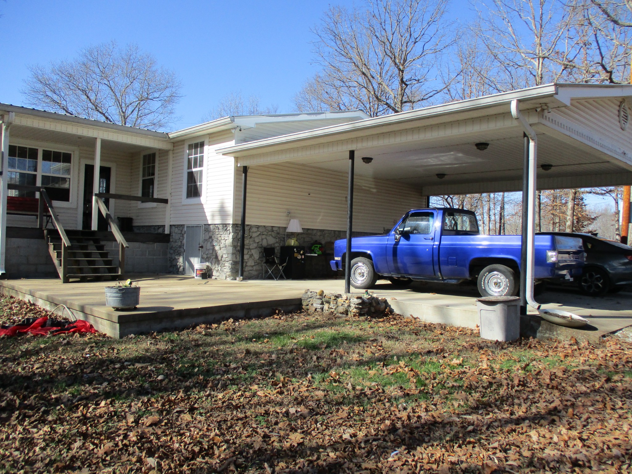 908 Bear Cub Run Centerville, TN 37033 - Photo 16 of 17 a view of a backyard with hardwood