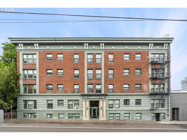 a front view of multi story residential apartment building