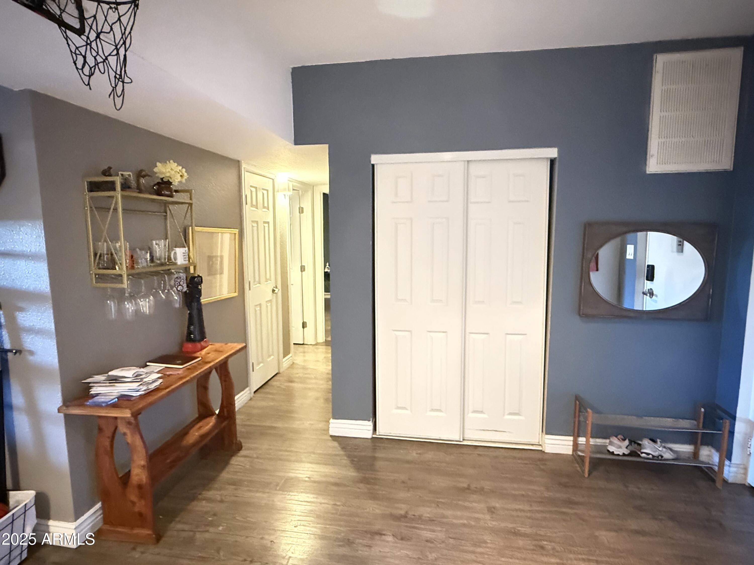 357 East Thomas Road, Unit A105 Phoenix, AZ 85012 - Photo 15 of 51 a view of a hallway with seating area