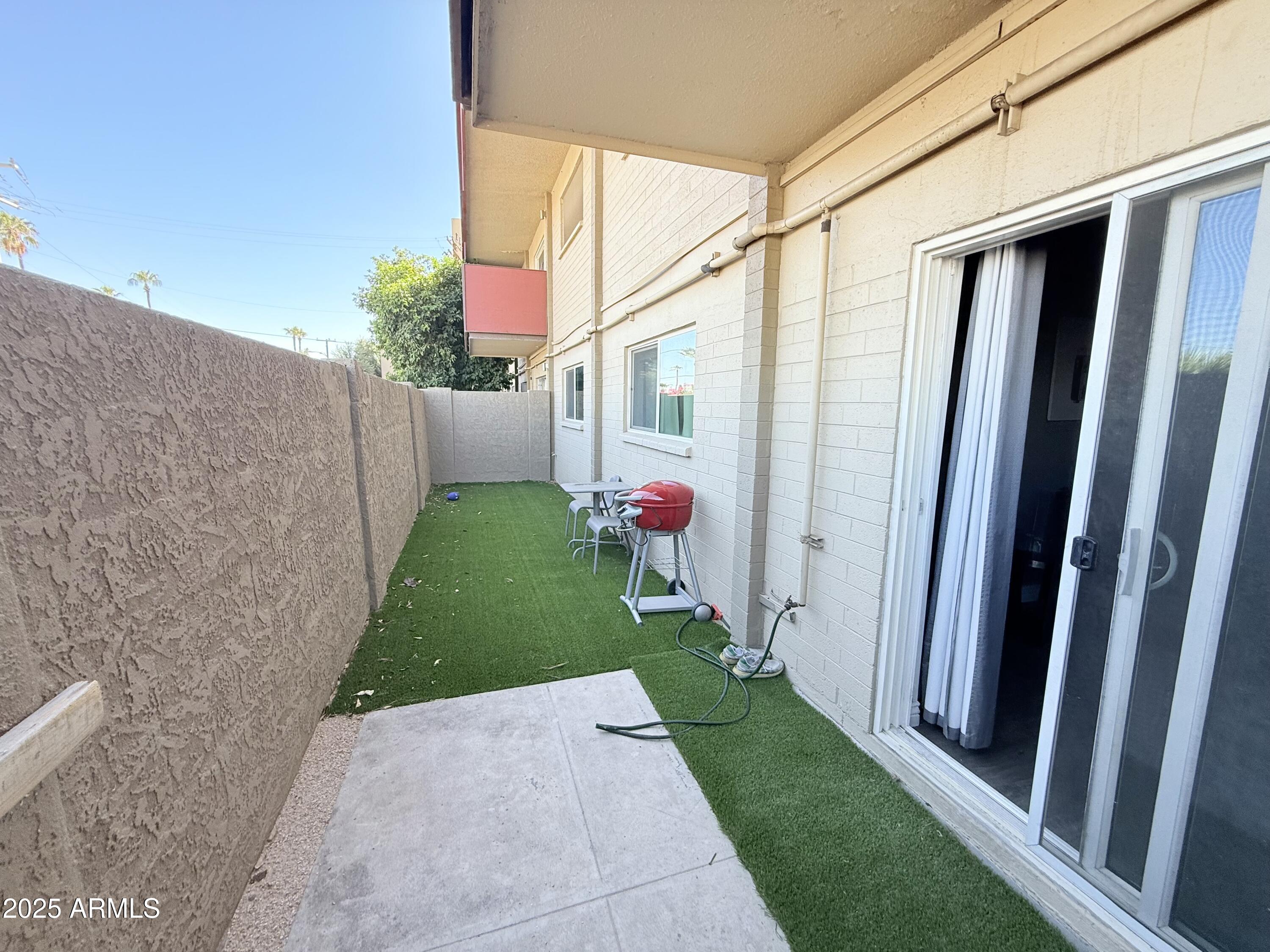 357 East Thomas Road, Unit A105 Phoenix, AZ 85012 - Photo 33 of 51 a view of a back yard of the house
