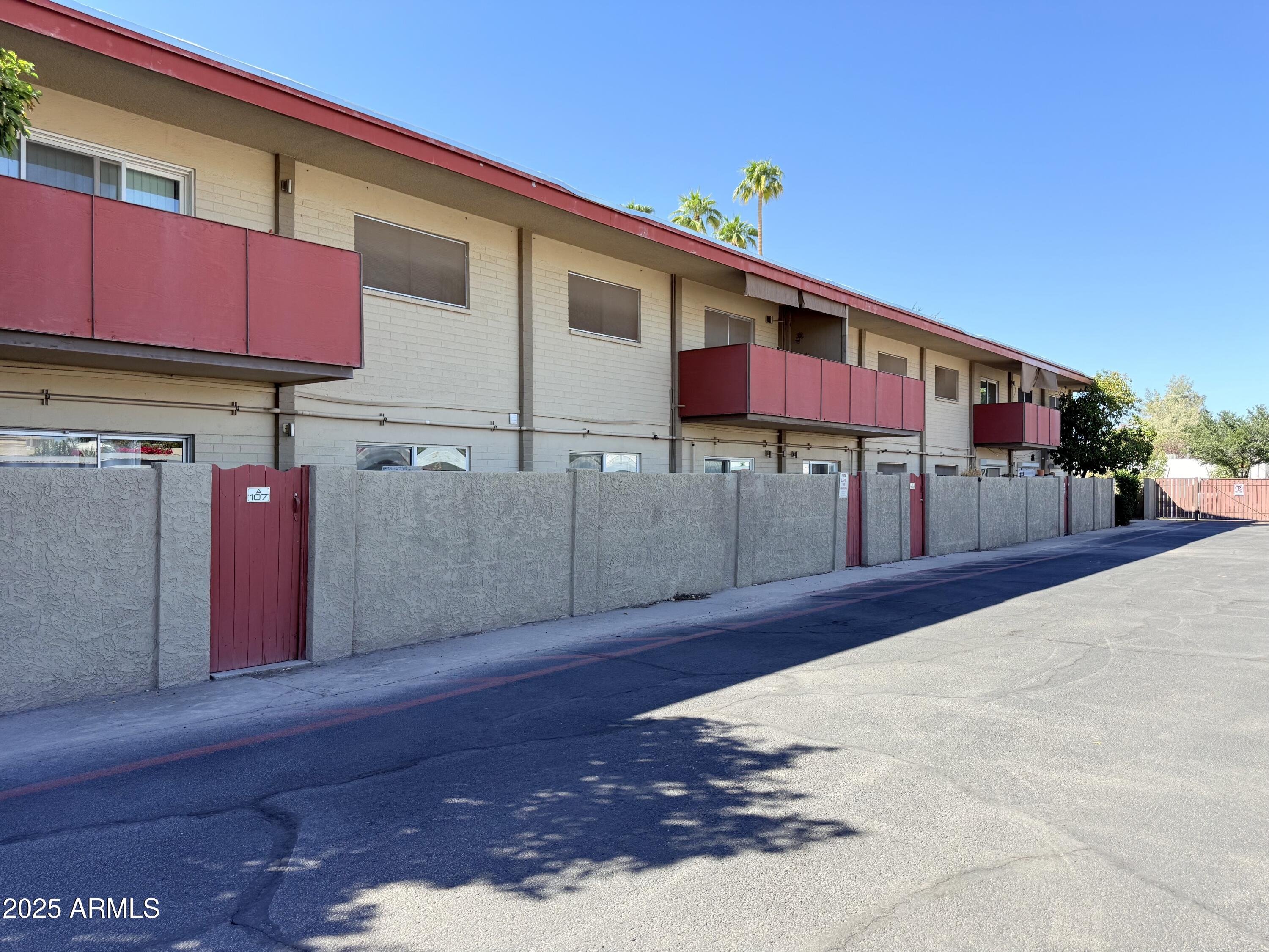 357 East Thomas Road, Unit A105 Phoenix, AZ 85012 - Photo 36 of 51 a front view of a building with retail shops