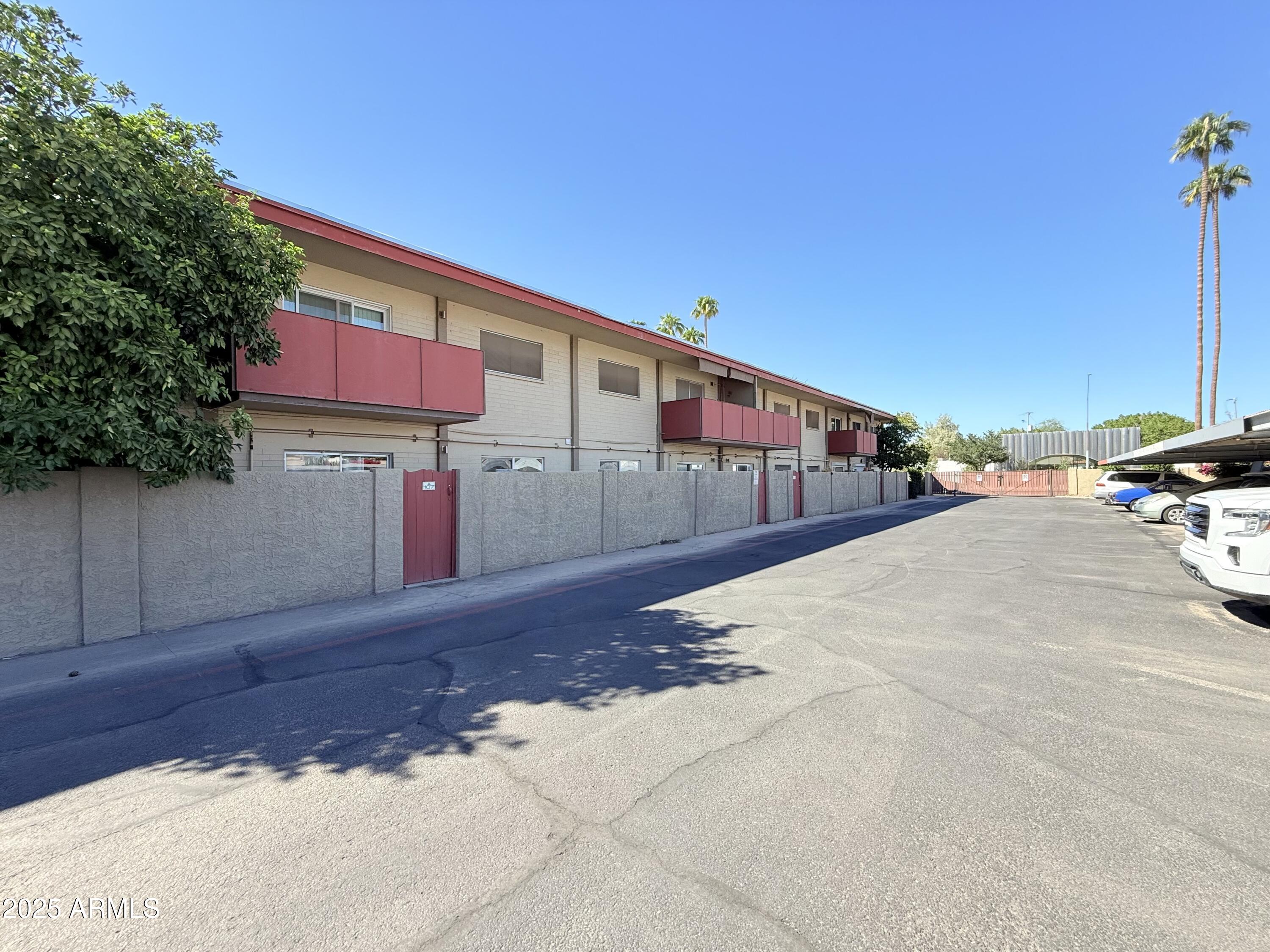357 East Thomas Road, Unit A105 Phoenix, AZ 85012 - Photo 37 of 51 a view of a street with houses