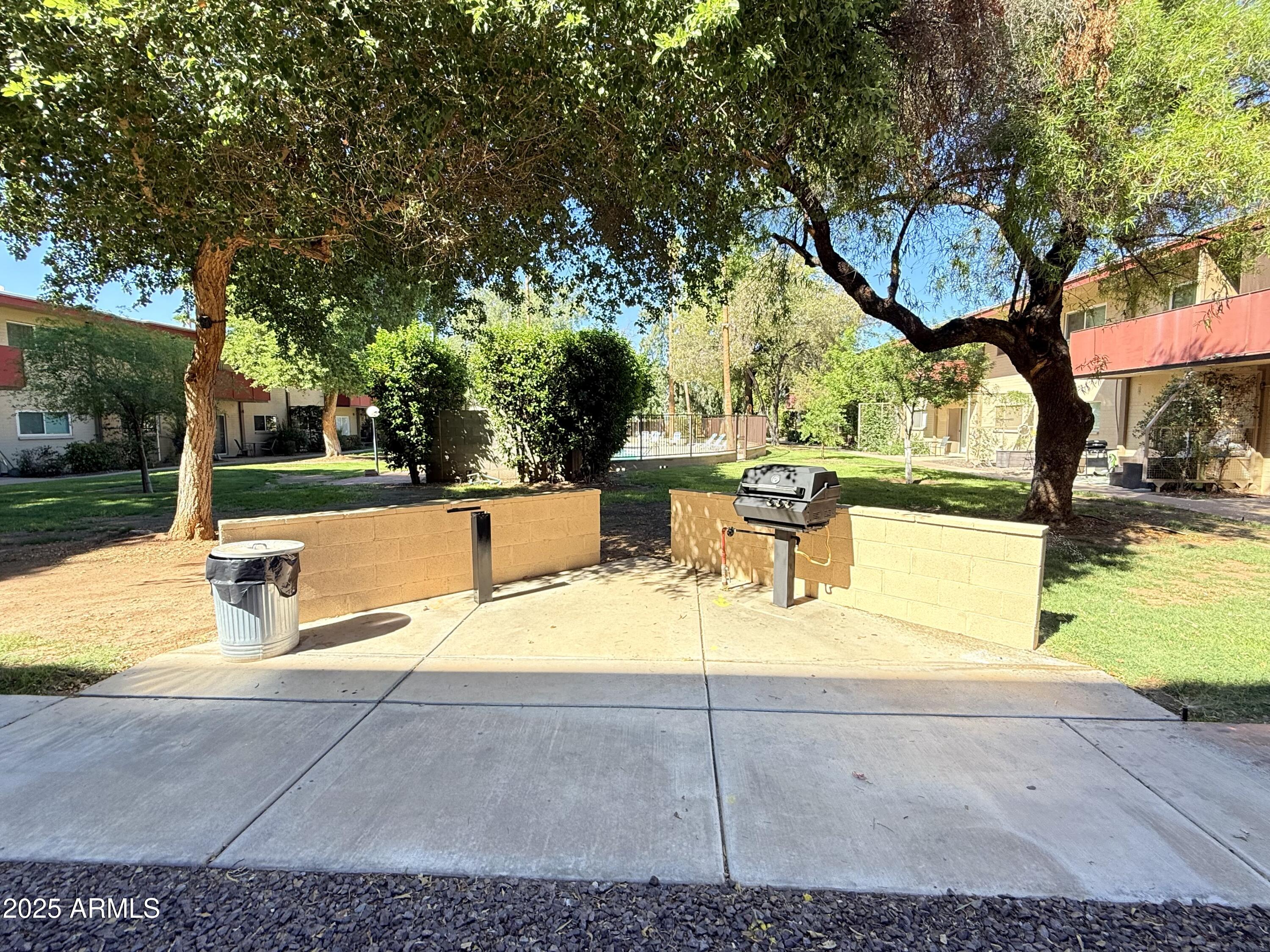 357 East Thomas Road, Unit A105 Phoenix, AZ 85012 - Photo 41 of 51 a view of a yard with swimming pool