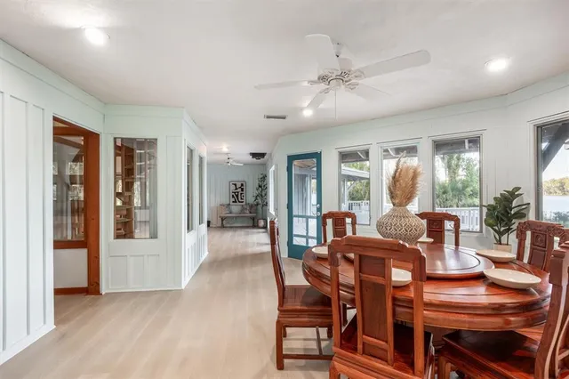 a view of living room with furniture and windows