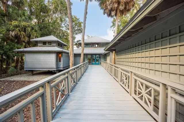 a yellow house with garden space