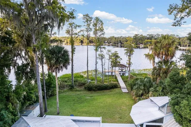 a view of a lake with a car park