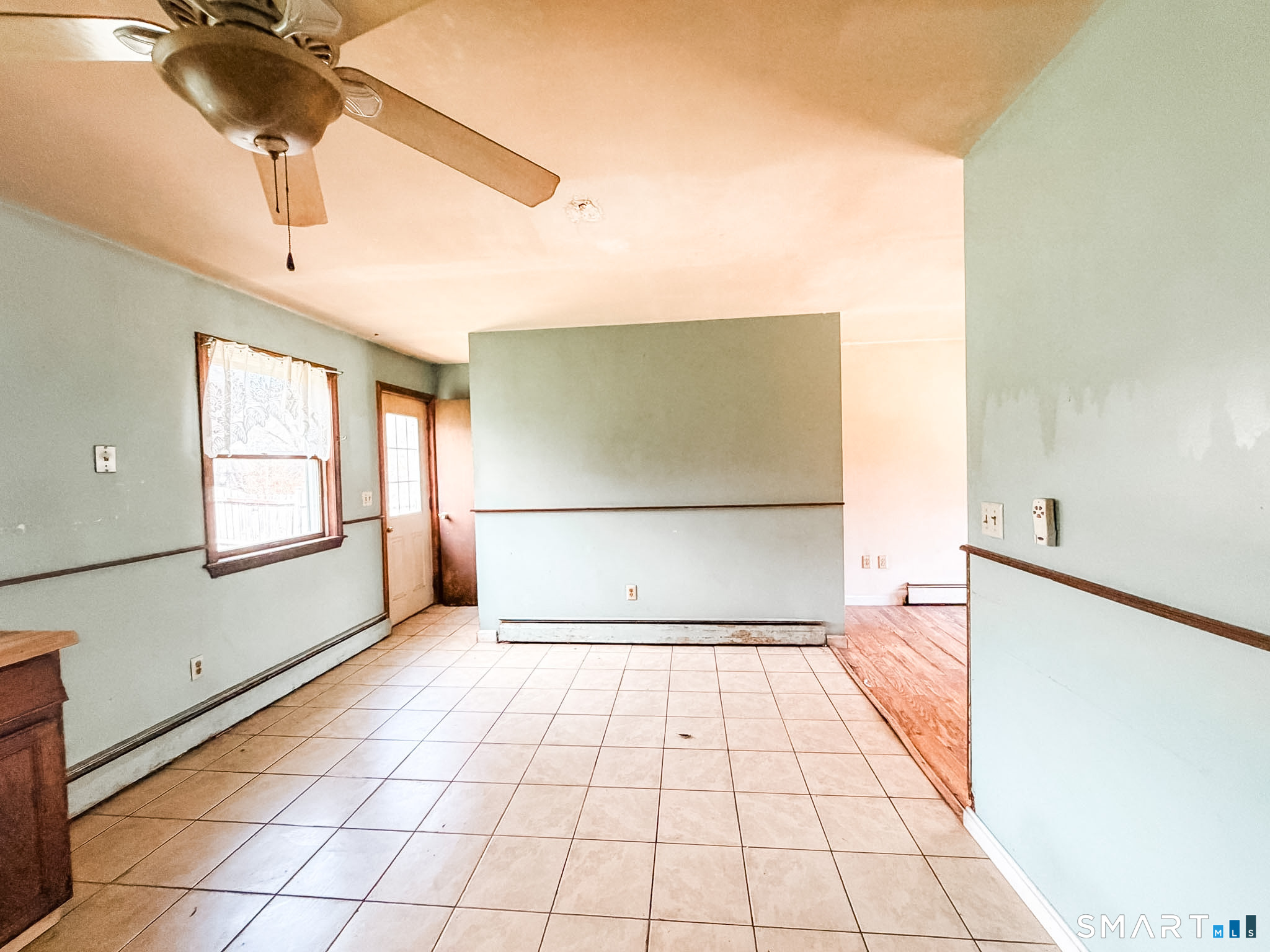 21 Potvin Avenue Plainfield, CT 06354 - Photo 12 of 17 a view of empty room with wooden floor