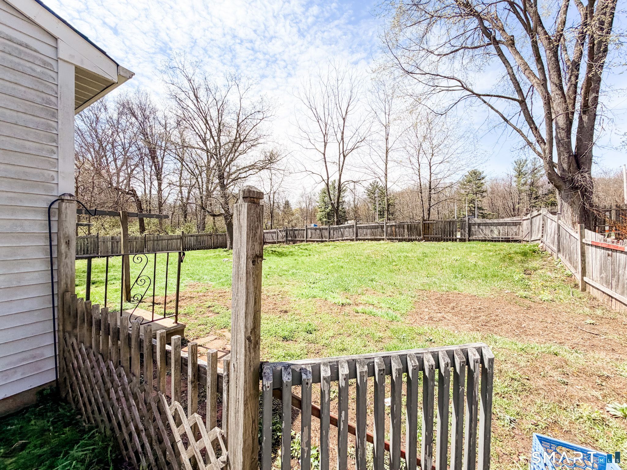 21 Potvin Avenue Plainfield, CT 06354 - Photo 2 of 17 a view of an outdoor space with deck and a garden