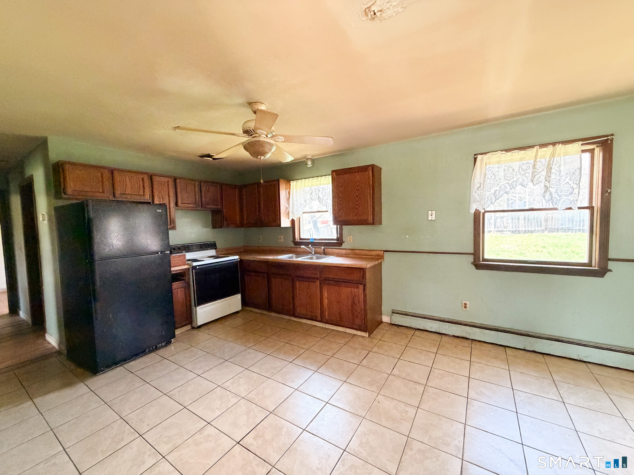 21 Potvin Avenue Plainfield, CT 06354 - Photo 6 of 17 a kitchen with stainless steel appliances granite countertop a refrigerator and a stove top oven