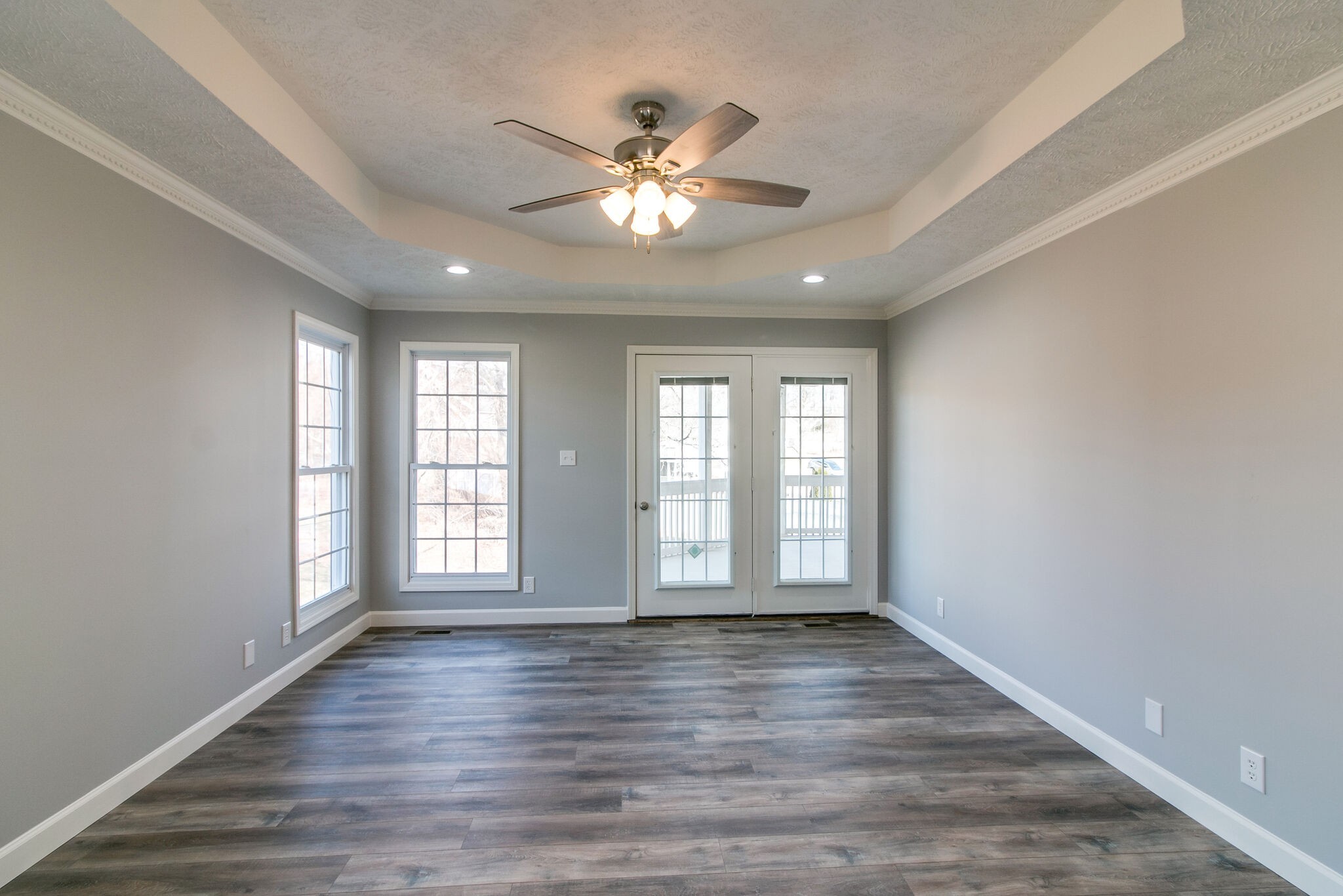 3595 Rabbit Run Trail Clarksville, TN 37043 - Photo 12 of 30 a view of an empty room with wooden floor and a window