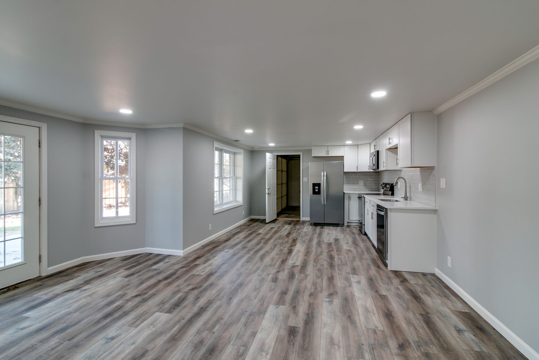 3595 Rabbit Run Trail Clarksville, TN 37043 - Photo 21 of 30 a view of kitchen with wooden floor and electronic appliances