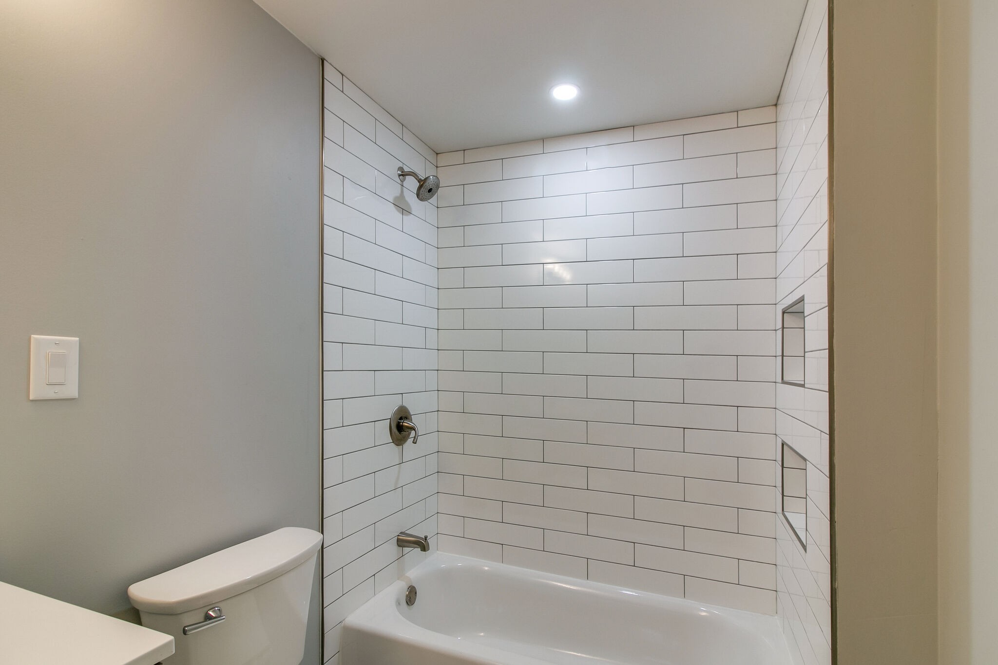 3595 Rabbit Run Trail Clarksville, TN 37043 - Photo 27 of 30 a bathroom with a shower and a toilet