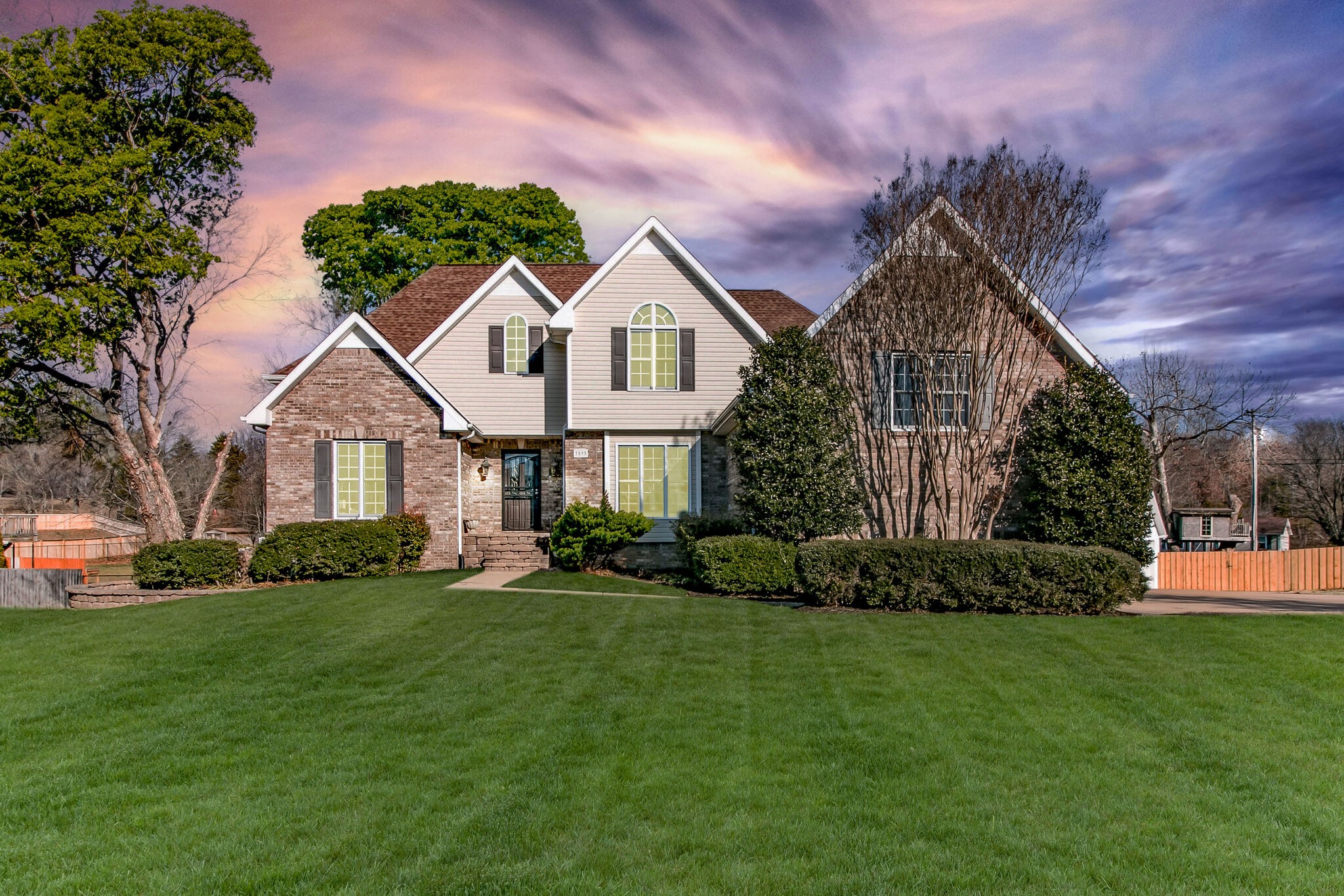 3595 Rabbit Run Trail Clarksville, TN 37043 - Photo 29 of 30 a front view of a house with a yard and trees