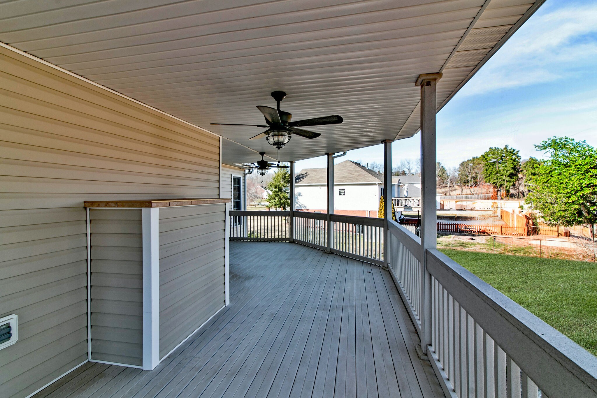 3595 Rabbit Run Trail Clarksville, TN 37043 - Photo 30 of 30 a view of a porch with wooden floor