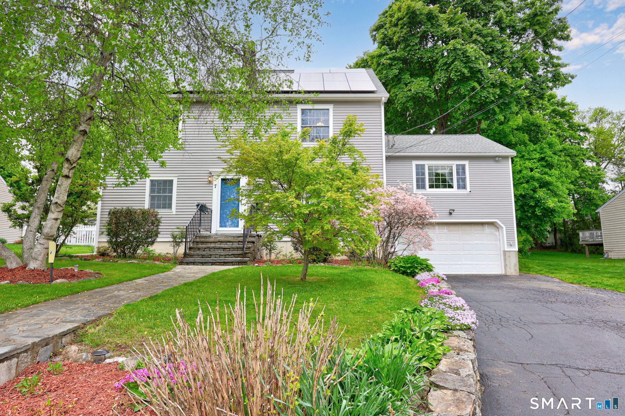 7 Merrill Road Trumbull, CT 06611 - Photo 1 of 40 a front view of a house with a yard