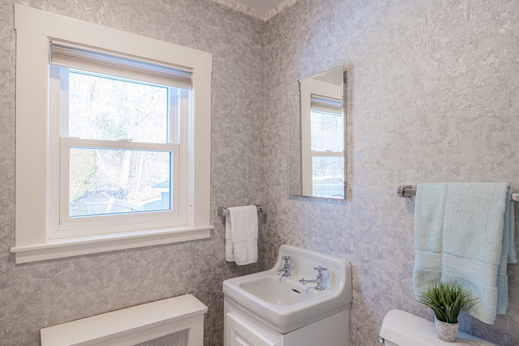 61 Nason Road Swampscott, MA 01907 - Photo 15 of 37 a bathroom with a sink and a window