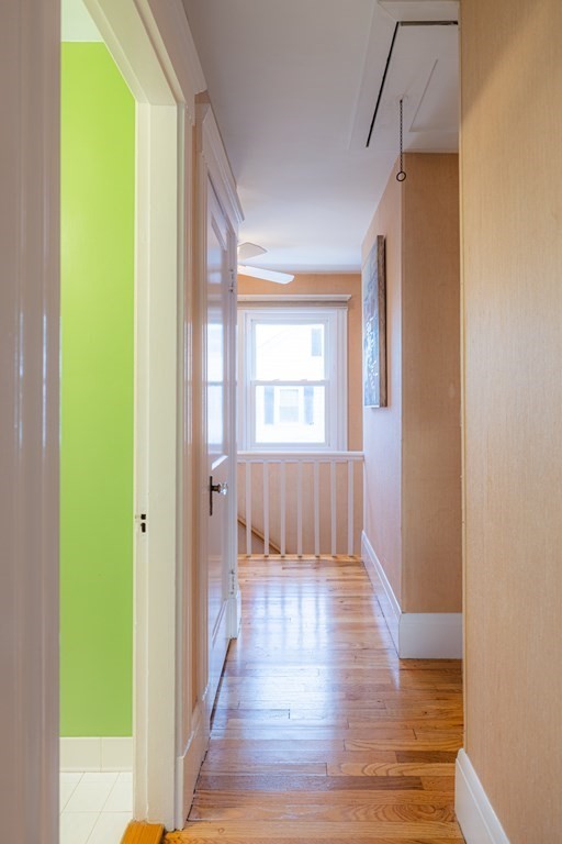 61 Nason Road Swampscott, MA 01907 - Photo 19 of 37 a view of an empty room with window and wooden floor