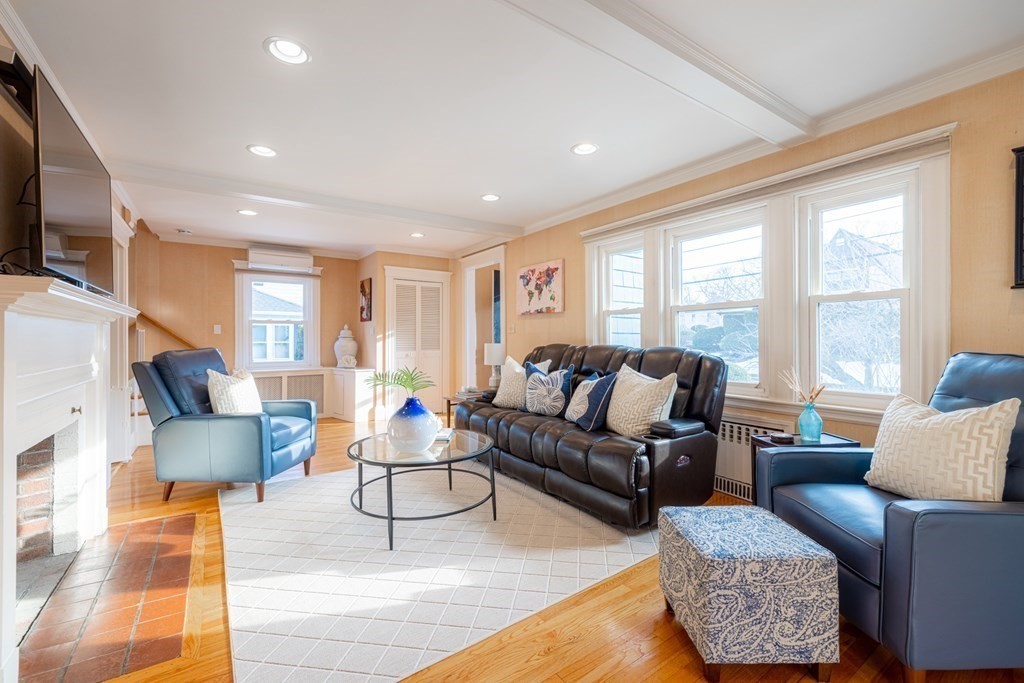 61 Nason Road Swampscott, MA 01907 - Photo 2 of 37 a living room with furniture and a flat screen tv