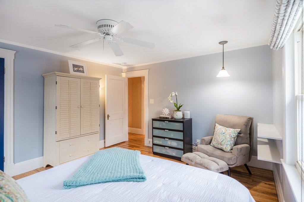 61 Nason Road Swampscott, MA 01907 - Photo 24 of 37 a bedroom with a bed and ceiling fan