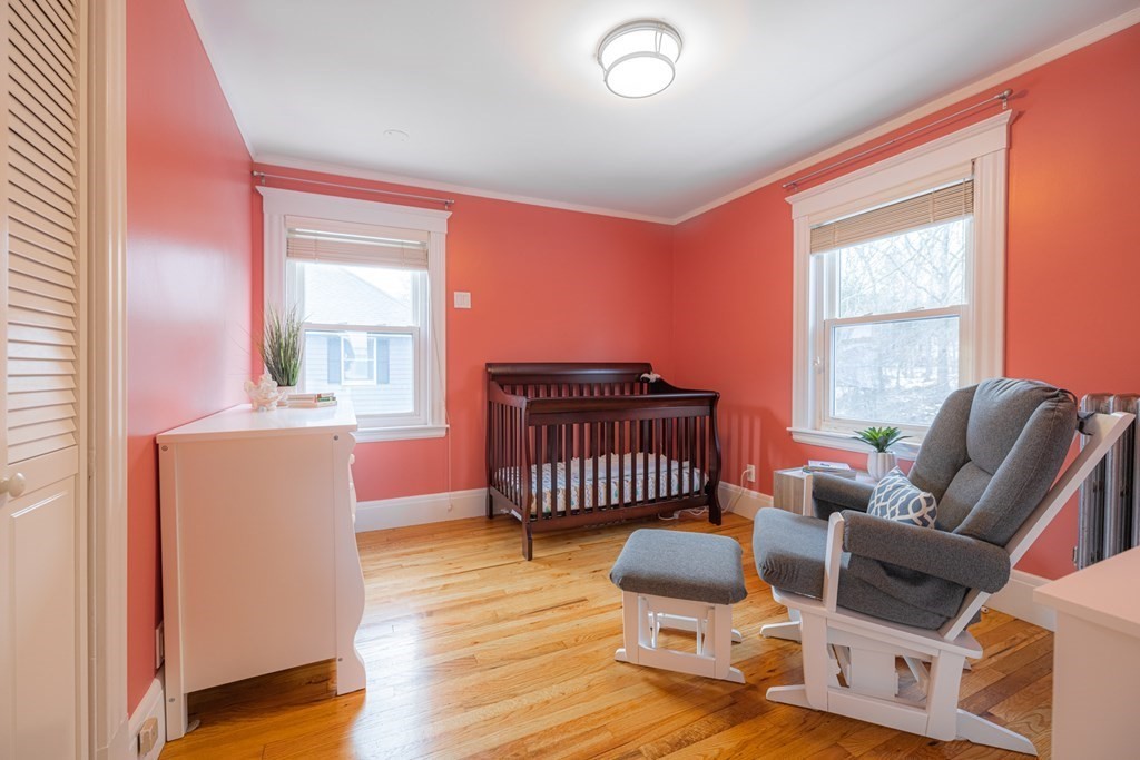 61 Nason Road Swampscott, MA 01907 - Photo 28 of 37 a bedroom with furniture and a window
