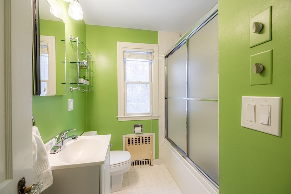 61 Nason Road Swampscott, MA 01907 - Photo 30 of 37 a bathroom with a sink mirror toilet and shower