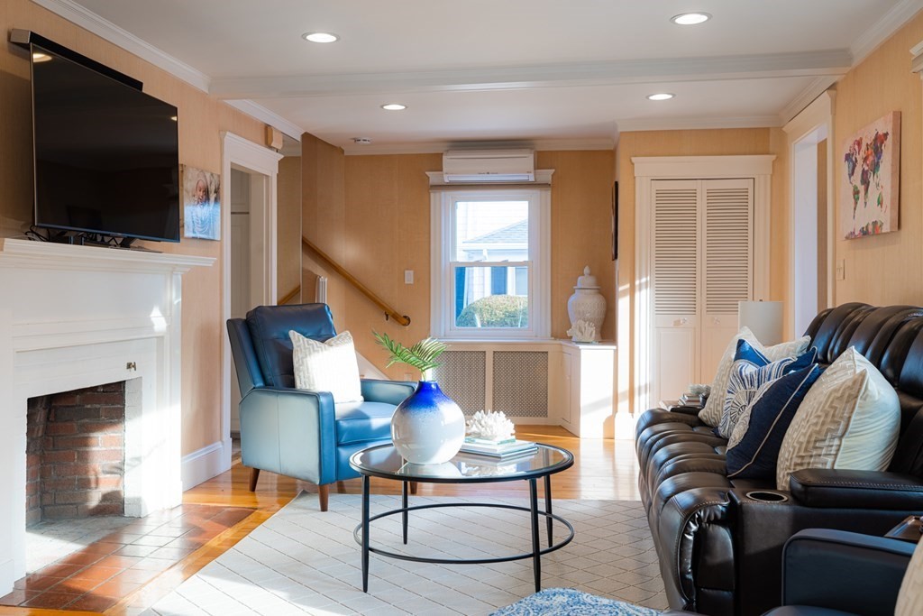 61 Nason Road Swampscott, MA 01907 - Photo 3 of 37 a living room with furniture and a flat screen tv