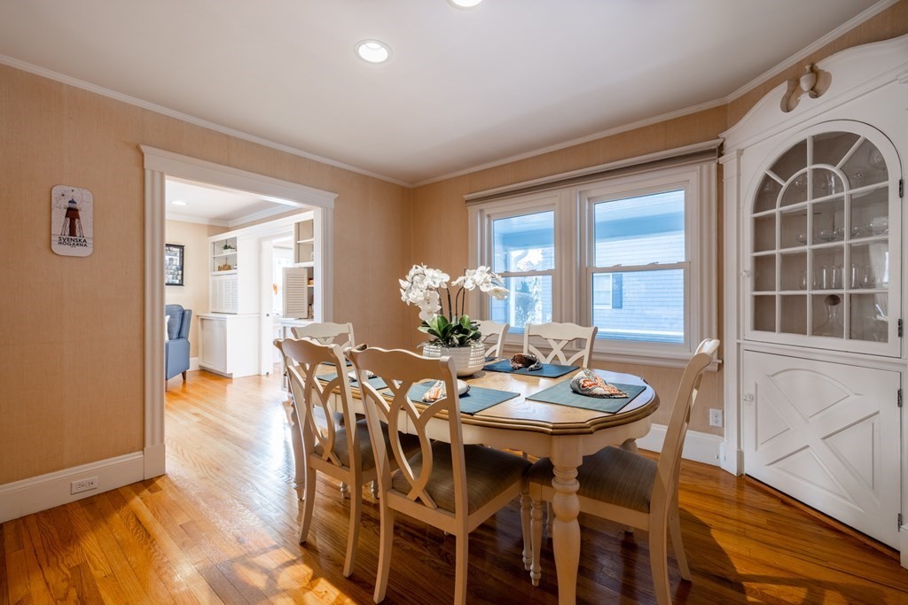 61 Nason Road Swampscott, MA 01907 - Photo 8 of 37 a dining room with furniture a rug and wooden floor