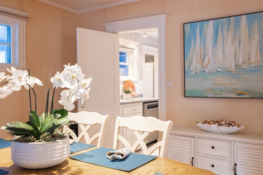 61 Nason Road Swampscott, MA 01907 - Photo 9 of 37 a dining room with furniture and wooden floor