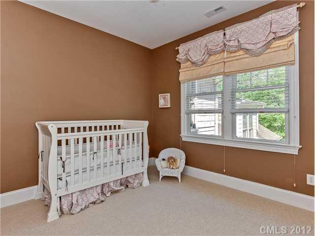 403 Ashworth Road Charlotte, NC 28211 - Photo 14 of 16 a bedroom with a bed and a window